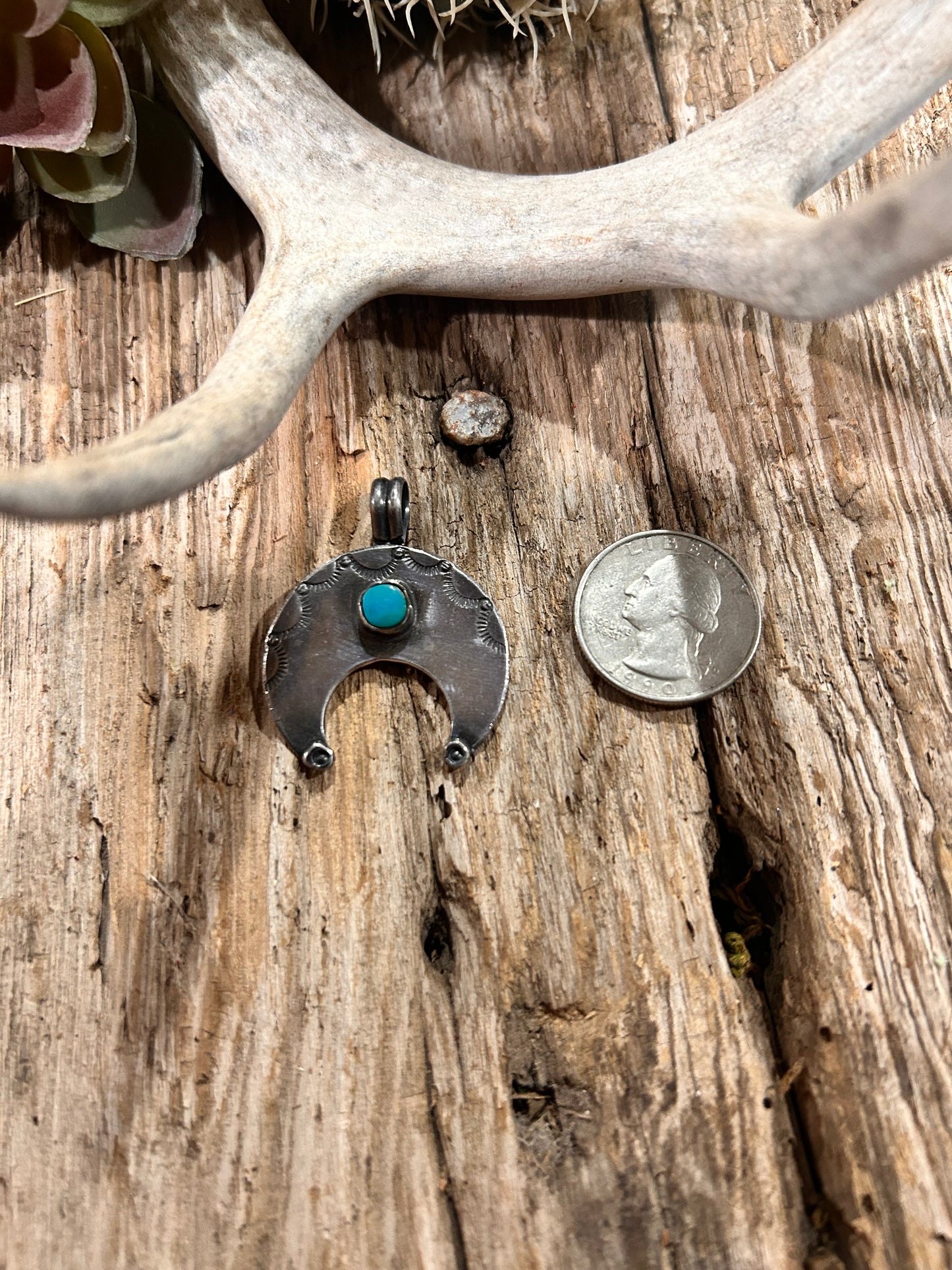 Sterling Naja with running horse marking