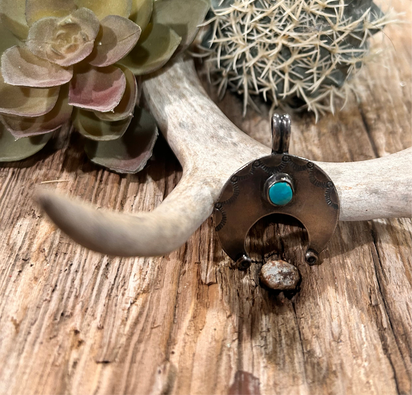 Sterling Naja with running horse marking